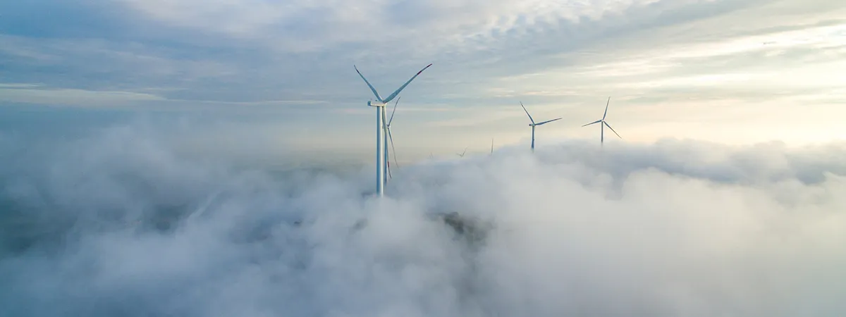 Wind Power Generation In The Sea Of Clouds，Wind Power Generator Before Sunrise Sunset