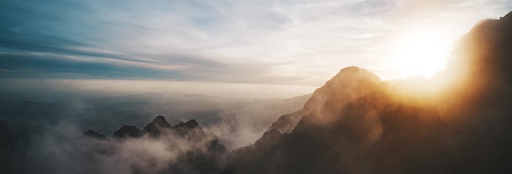 Mountain peaks in fog